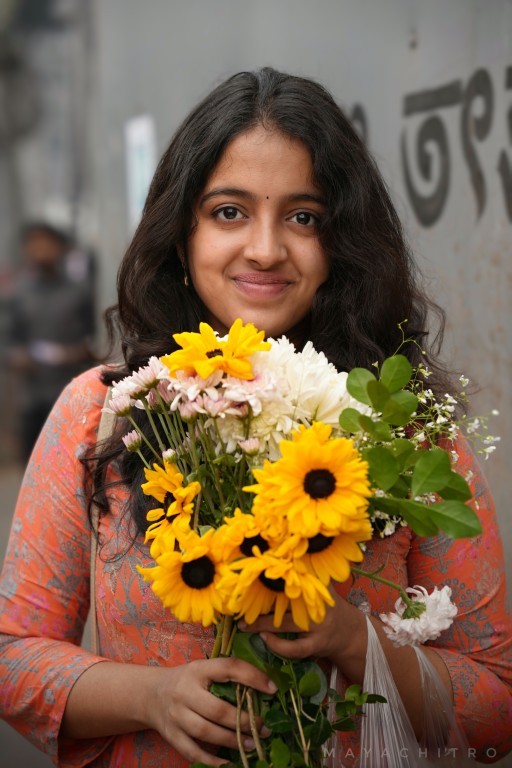 Girl with Sunflower Bouquet