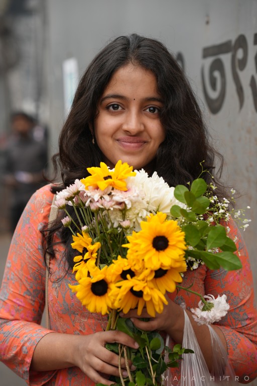 Smiling Bengali Girl Holding Flower Bouquet Street Portrait