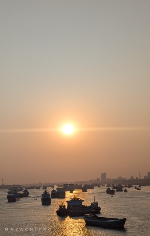 Sunset Over Harbor Boats